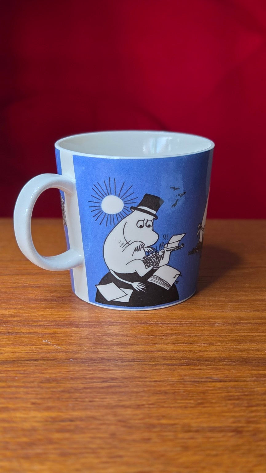 Muumimuki kuvitus ja kahva