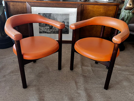 Oranssit nahkatuolit 70-luku
