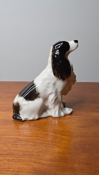 Lomonosov posliinifiguuri – istuva spanieli, korkeus 14 cm